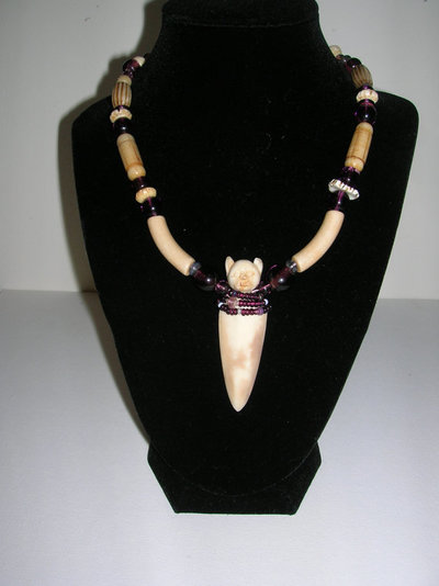 Cat Choker - Carved elk antler, old Chinese glass, clay, bone $275
                  