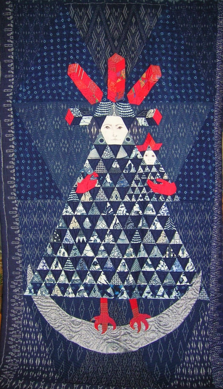 From the tradition of animal bride/animal groom tales wherein a human man captures a bird or a seal or some wild creature and makes her his wife, there is a child (symbol of the union of wild and domestic) but then the man breaks his promise to the woman/creature and she disappears back into the wild.  The reverse of this quilt shows only 2 red hands.