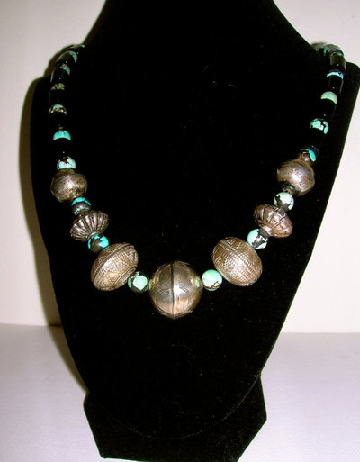 Chinese turquoise, Saudi black glass, handmade          Navajo silver beads, Nepali silver - $250